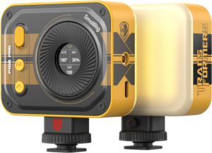 800q-01_134236 The SmallRig 5511 Vibe P108 Pro mini LED video light - BumbleBee Edition features a yellow and black design, Transformers branding, control buttons, adjustable control knobs and a digital display for hue, intensity, saturation and colour temperature settings.