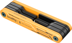 SmallRig 5517 Foldable Multi-Tool Kit - BumbleBee Edition on pienikokoinen oranssi-musta työkalu, jonka kyljessä lukee "SmallRig" ja "FREE YOUR DREAM" sekä © 2025 Hasbro -merkki, kuvassa kevyellä pinnalla.