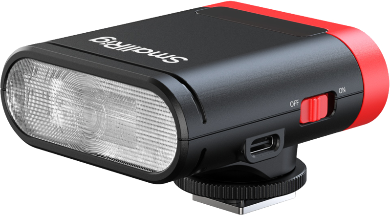 800q-01_134254 SmallRig 5374 RS20 mini Speedlite Flash -salama on kompakti, suorakulmainen LED-kameravalaisin, jossa on musta runko, punaiset korostukset, ON/OFF-kytkin, USB-C-portti, läpikuultava etupaneeli, kylmä kenkäkiinnitys pohjassa ja "Smallrig" painettu yläosaan.
