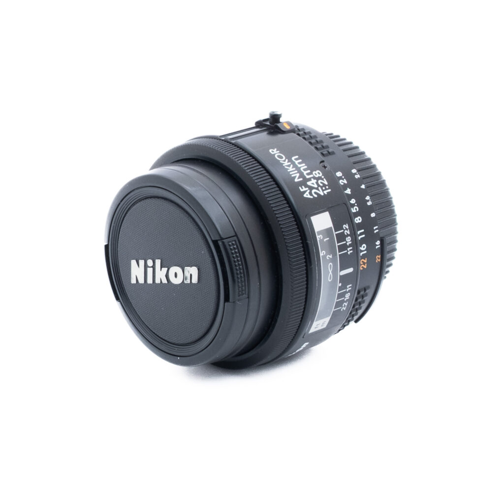 Nikon AF 24mm f28-3 Nikon AF Nikkor 24mm f/2.8 (Kunto K5) - Käytetty