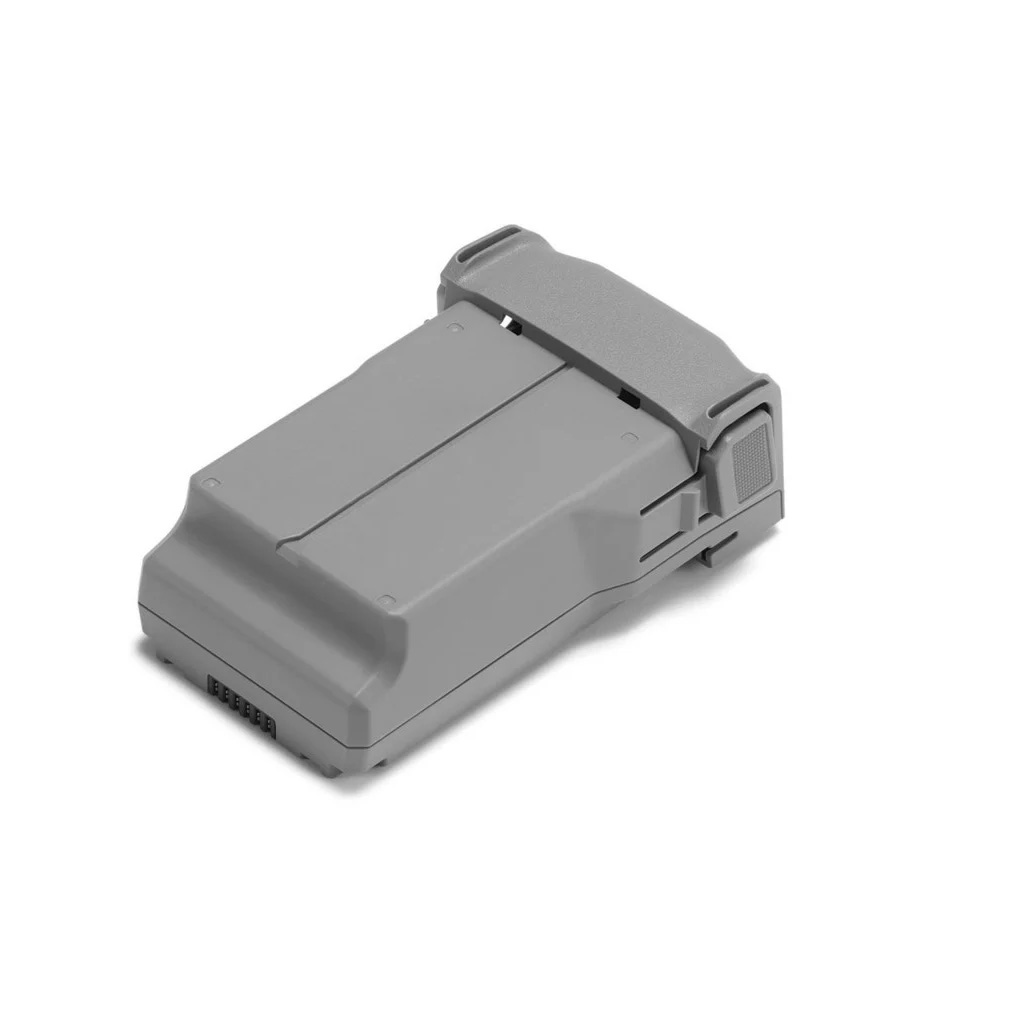 akku DJI Mini 5 Pro Intelligent Flight Battery -akku, harmaa ja suorakulmainen, jossa on salpa ja liitinliittimet, kuvassa valkoisella pohjalla.