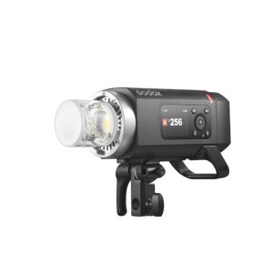 godox_ad400_pro_ii_07 The black Godox Witstro AD400 Pro II studio strobe light with digital display, control buttons and bracket for lamp stands is shown in a diagonal white background.
