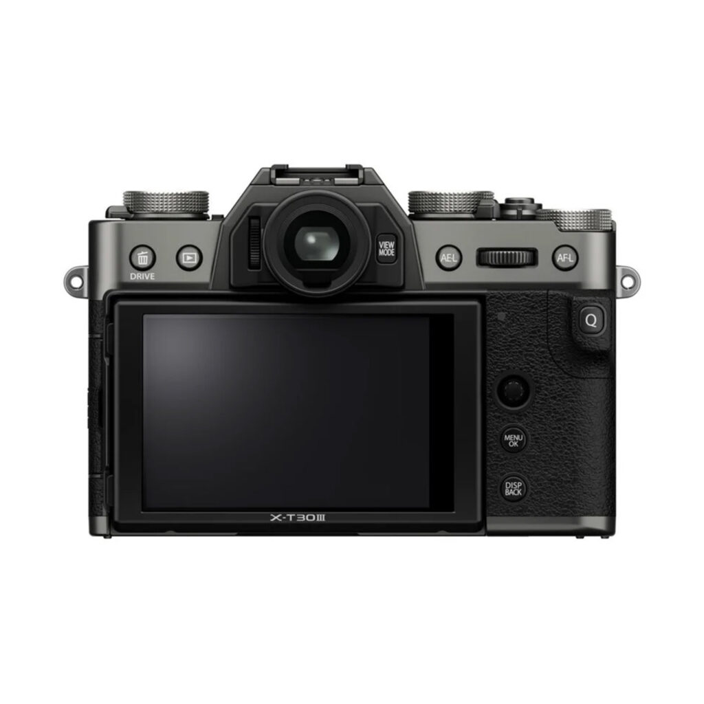 FujiX-T30IIIHarmaa4 Fujifilm X-T30 III Body Harmaa (Charcoal Silver) näkyy takaa, ja siinä on suuri LCD-näyttö, useita ohjauspainikkeita, valintakiekot, etsin ja musta muotoilu hopeisilla korostuksilla.