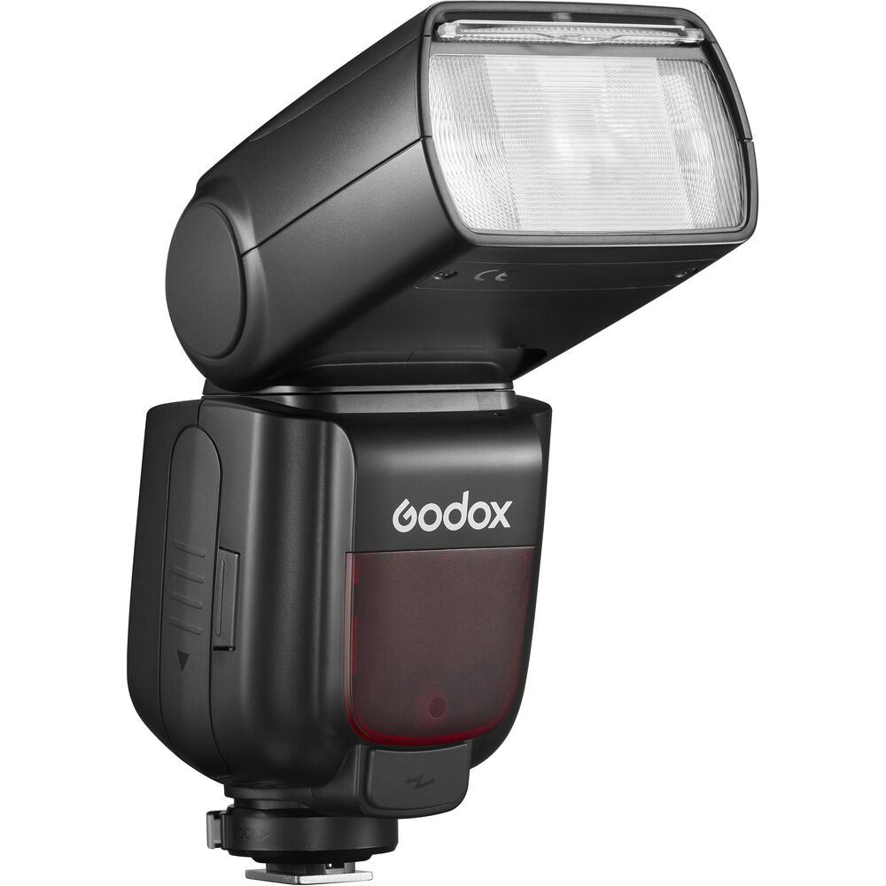 1636699946_604 The Godox Speedlite TT685 II flash for Sony cameras features a rectangular flash head, a red cell panel and a mounting bracket against a white background.