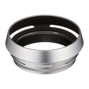Fujifilm-LH-x100-vastavalosuoja Hopeinen Fujifilm LH-X100 -vastavalosuoja (Käytetty), jossa on pyöreä metallinen muotoilu ja leikattuja aukkoja valkoista taustaa vasten.