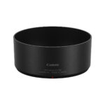 canon_lens-hood_es-73B The Canon ES-73B lens cover is black with a matte finish, has white text showing the model and brand name, and has a small red alignment dot near the bottom.