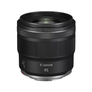 canon_rf_45mm_f12_03 The black Canon RF 45mm f/1.2 STM lens stands upright against a white background, with its textured rings and side switch.