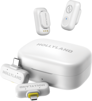 800q-01_133529 Hollyland LARK A1 Combo Ivory White -langaton mikrofonijärjestelmä sisältää latauskotelon, USB-C- ja Lightning-liittimet sekä kaksi kompaktia mikrofonia, jotka on esitetty tavallisella valkoisella pohjalla.