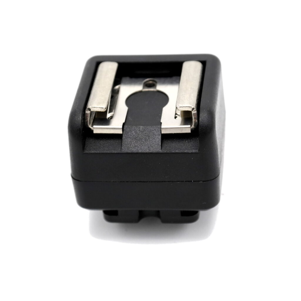 1482402971_484 Caruba Hot Shoe Adapter (Middle Contact to X-Contact) -salamakenkäsovitin