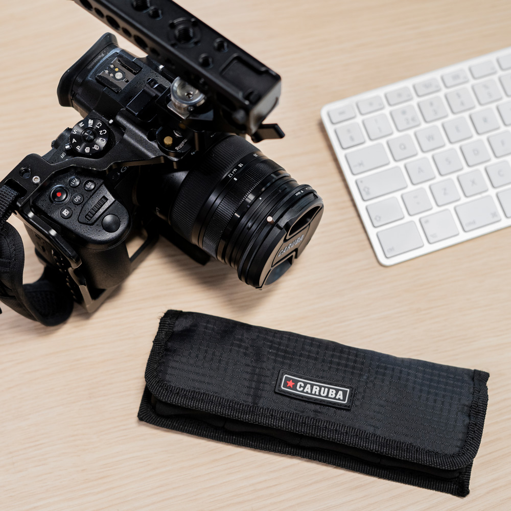 1604320988_195 Caruba Battery Holder Pro 4 pieces Black -akkujen suojapussi