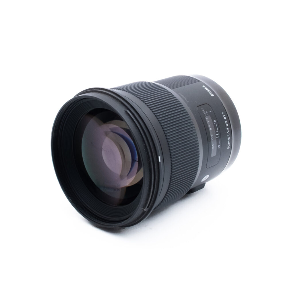 Sigma 50mm f14 DG Canon-2 Sigma Art 50mm f/1.4 DG Canon EF (sis. ALV 25,5%, Takuu 6kk) - Käytetty