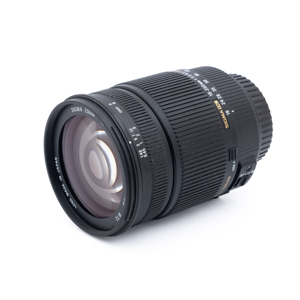 Sigma-DC-18-250mm-f3.5-6.3-canon-2 Sigma 18-250mm f/3.5-6.3 DC OS HSM Canon EF-S - Käytetty