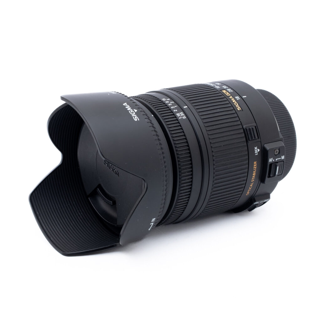 Sigma-DC-18-250mm-f3.5-6.3-macro-hsm-nikon-1 Sigma 18-250mm f/3.5-6.3 DC OS HSM Nikon F DX - Käytetty